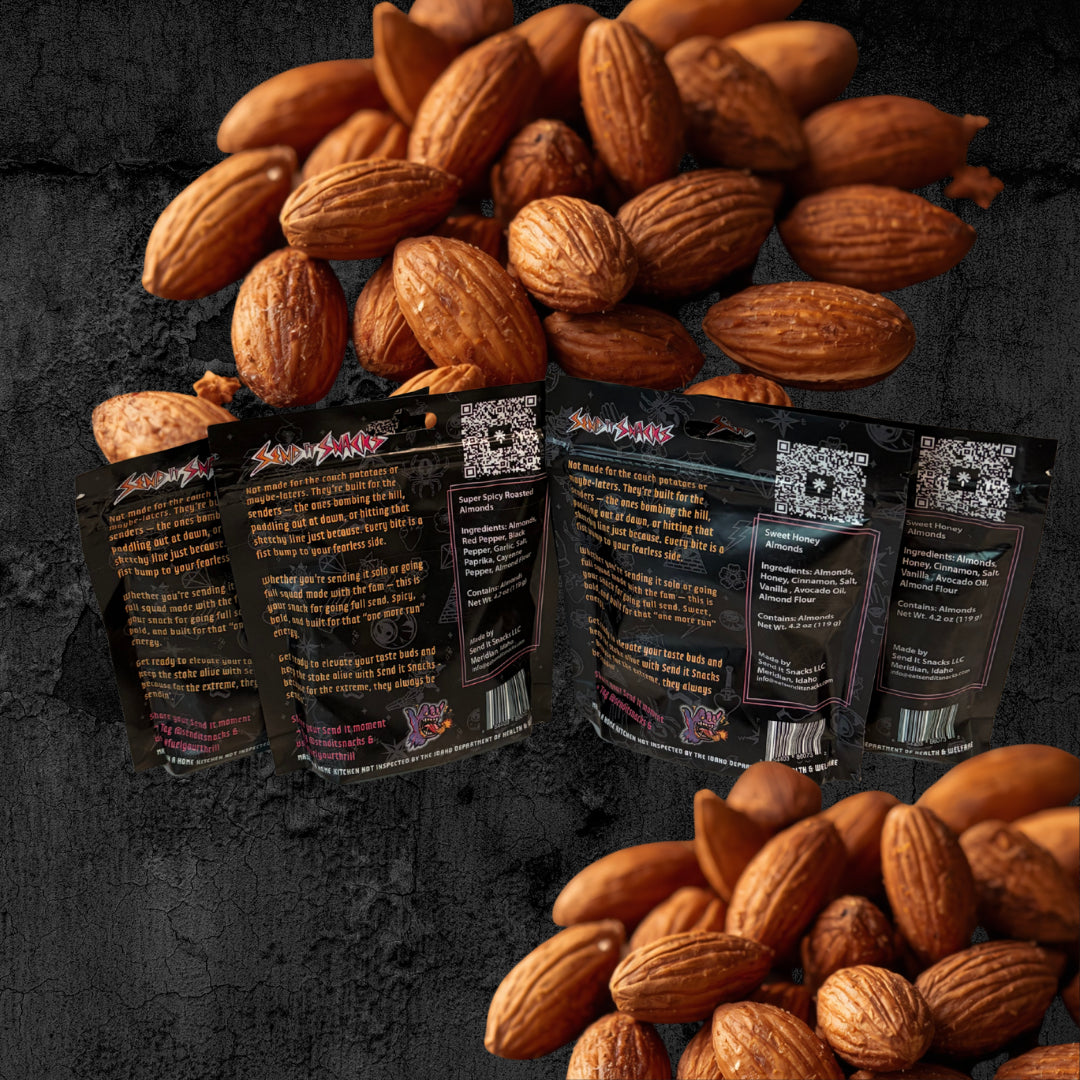 Backs of the 4-pack roasted almond bags surrounded by almonds